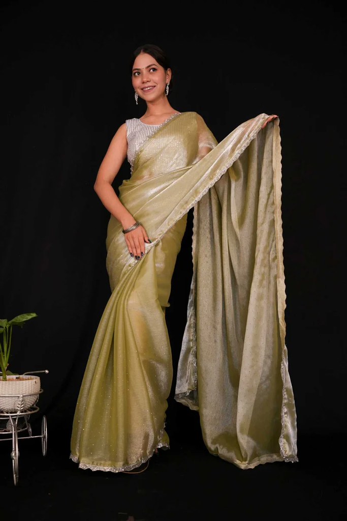 PISTA JIMMY CHOO SILK WITH SILVER LACE BORDER AND SEQUIN EMBELLISHMENTS ALL OVER PREDRAPED READY TO WEAR SAREE