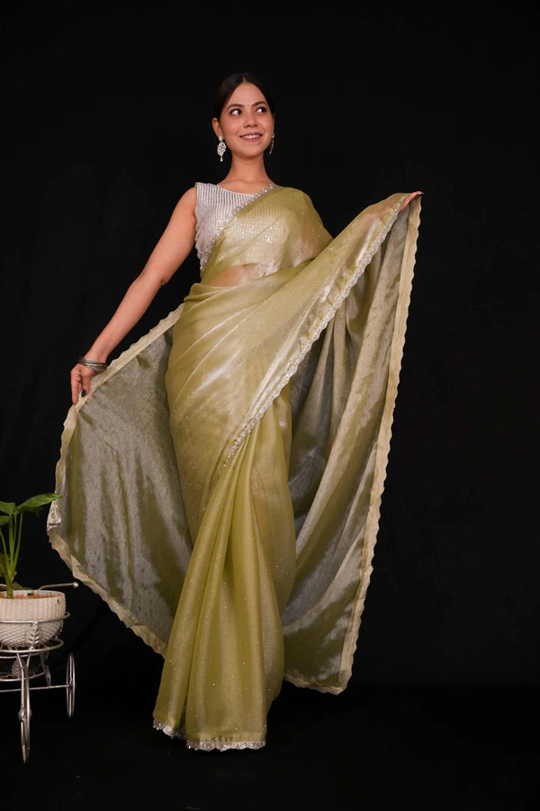 PISTA JIMMY CHOO SILK WITH SILVER LACE BORDER AND SEQUIN EMBELLISHMENTS ALL OVER PREDRAPED READY TO WEAR SAREE